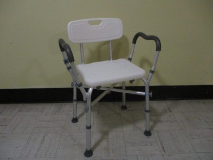 Shower chair with backrest and arms