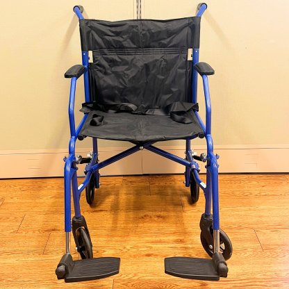 TRANSPORT WHEELCHAIR