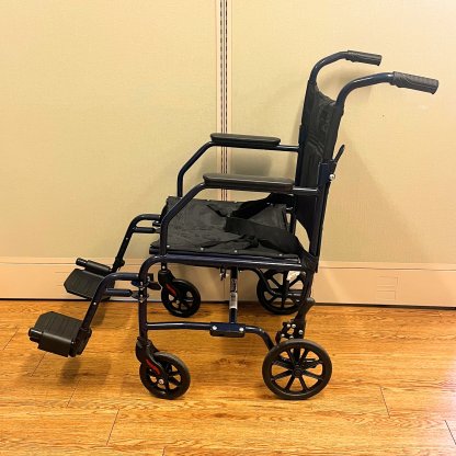 TRANSPORT WHEELCHAIR