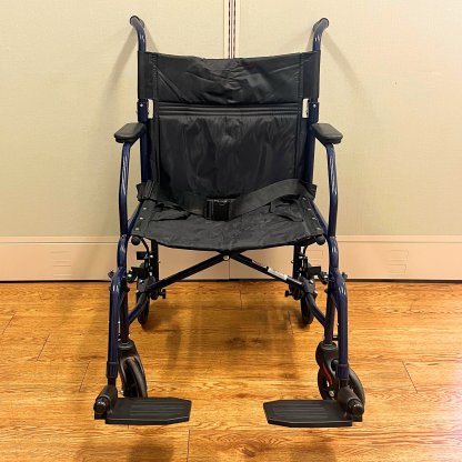 TRANSPORT WHEELCHAIR