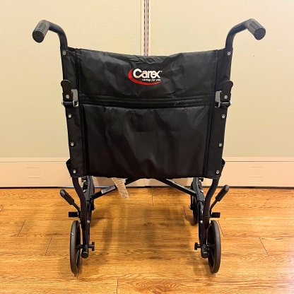 TRANSPORT WHEELCHAIR