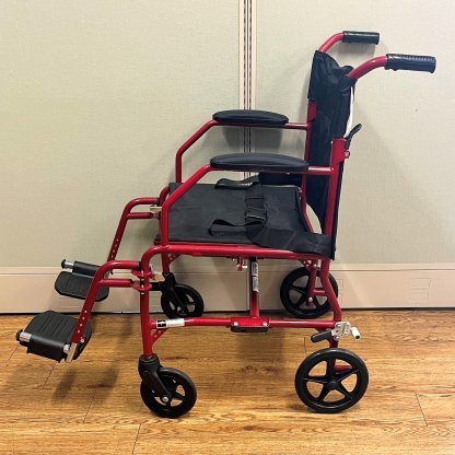TRANSPORT WHEELCHAIR
