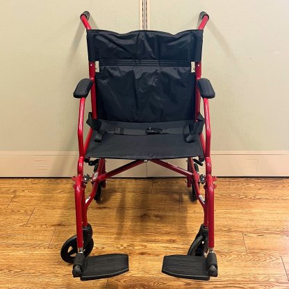 TRANSPORT WHEELCHAIR