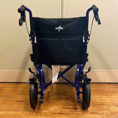 TRANSPORT WHEELCHAIR