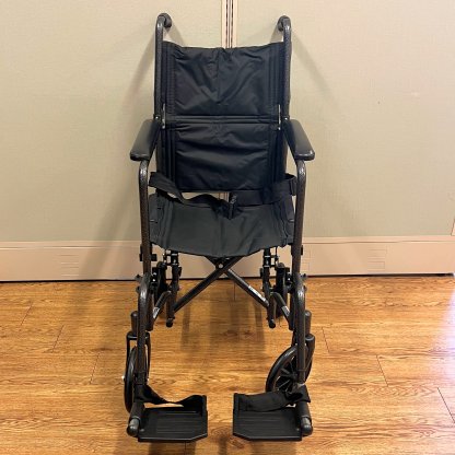 TRANSPORT WHEELCHAIR