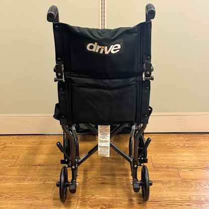 TRANSPORT WHEELCHAIR