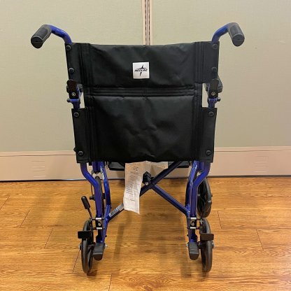 TRANSPORT WHEELCHAIR