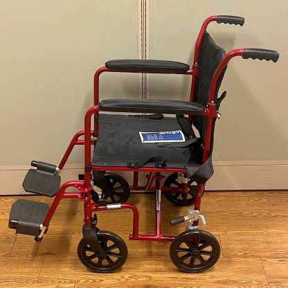 TRANSPORT WHEELCHAIR