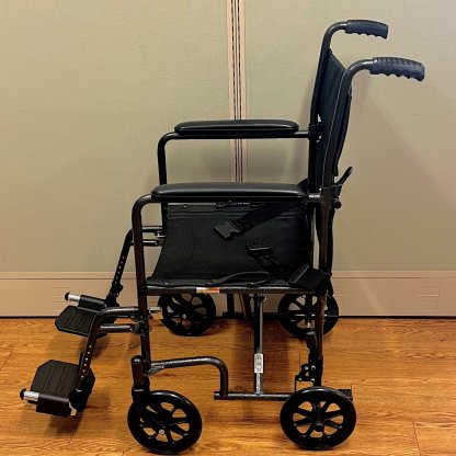 TRANSPORT WHEELCHAIR