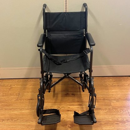 TRANSPORT WHEELCHAIR