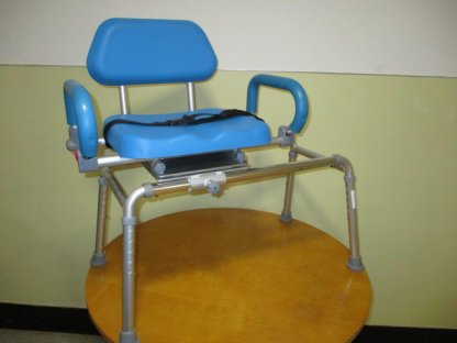 Transfer bench with sliding swivel seat