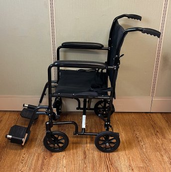 TRANSPORT WHEELCHAIR