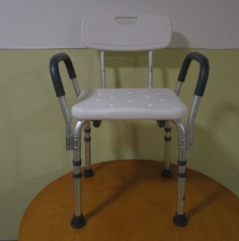 Shower chair with backrest and arms