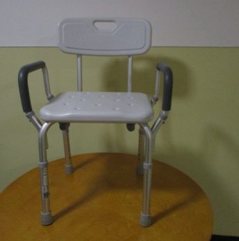 Shower chair with backrest and arms