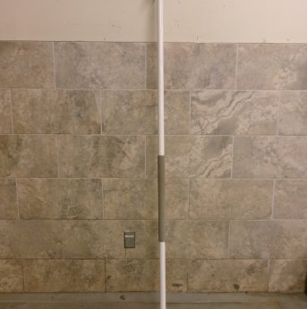 floor to ceiling security pole